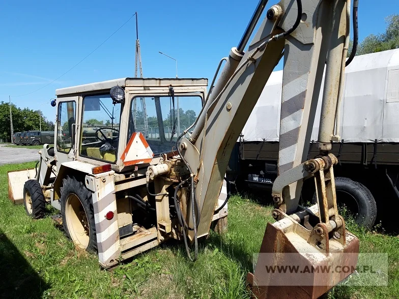 Koparko-ładowarka K-162 na ciągniku kołowym Rok produkcji:1985,Cena:24000